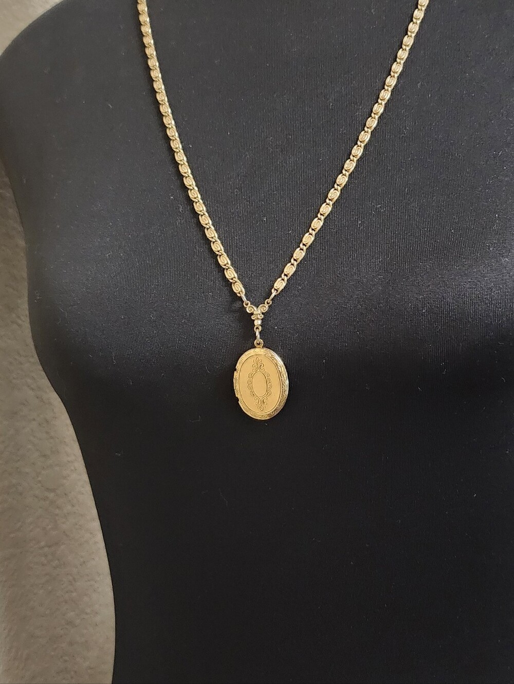 1928 Gold Tone Oval Locket Pendant Necklace Scroll Link Chain